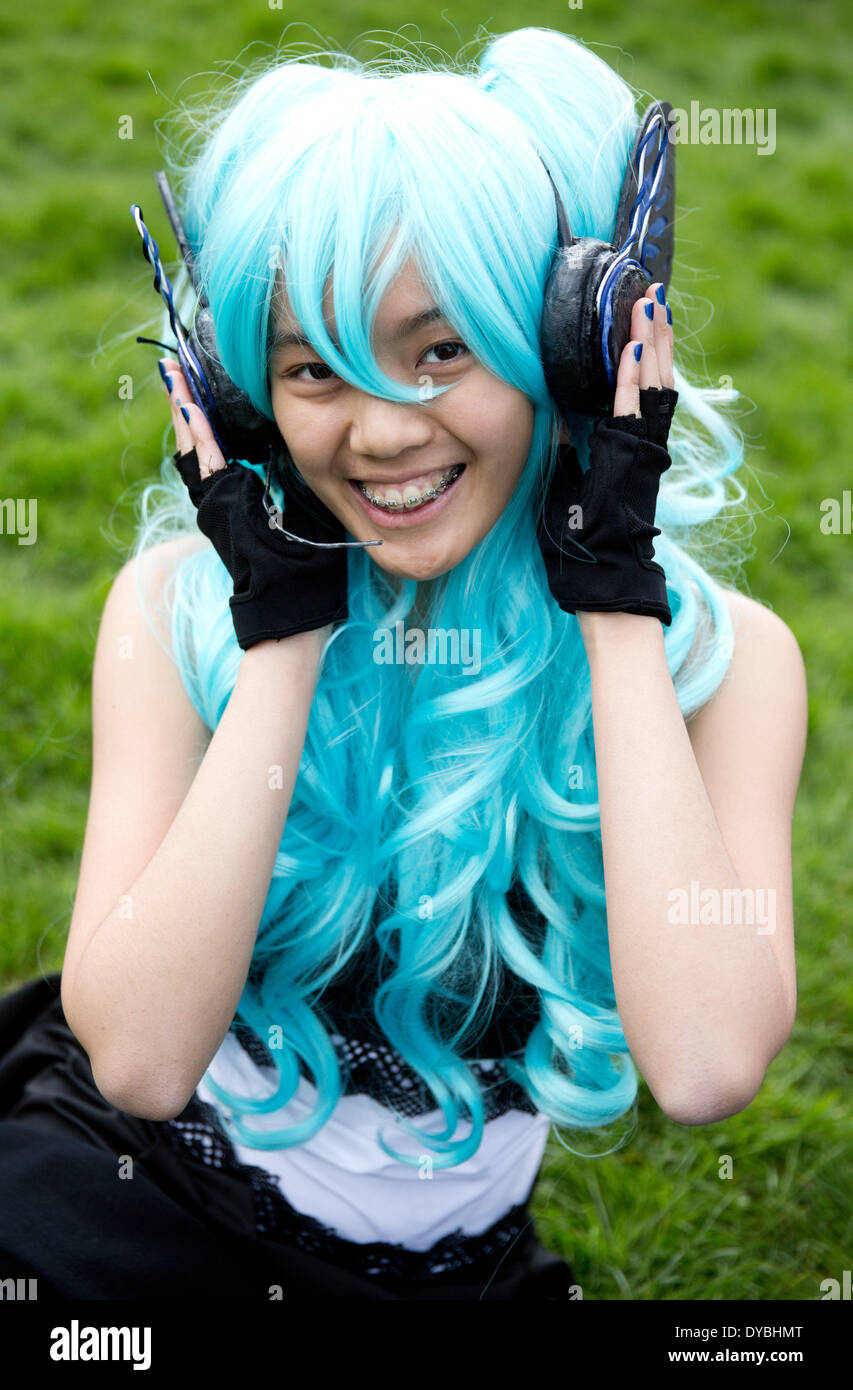 Berlin, Germany. 13th Apr, 2014. Minh Anh poses during the cherry blossom festival in Berlin, Germany, 13 April 2014. The traditional festival is celebrated in the 'Gaerten der Welt' ('Gardens of the World' lit.). Photo: Joerg Carstensen/dpa/Alamy Live News Stock Photo