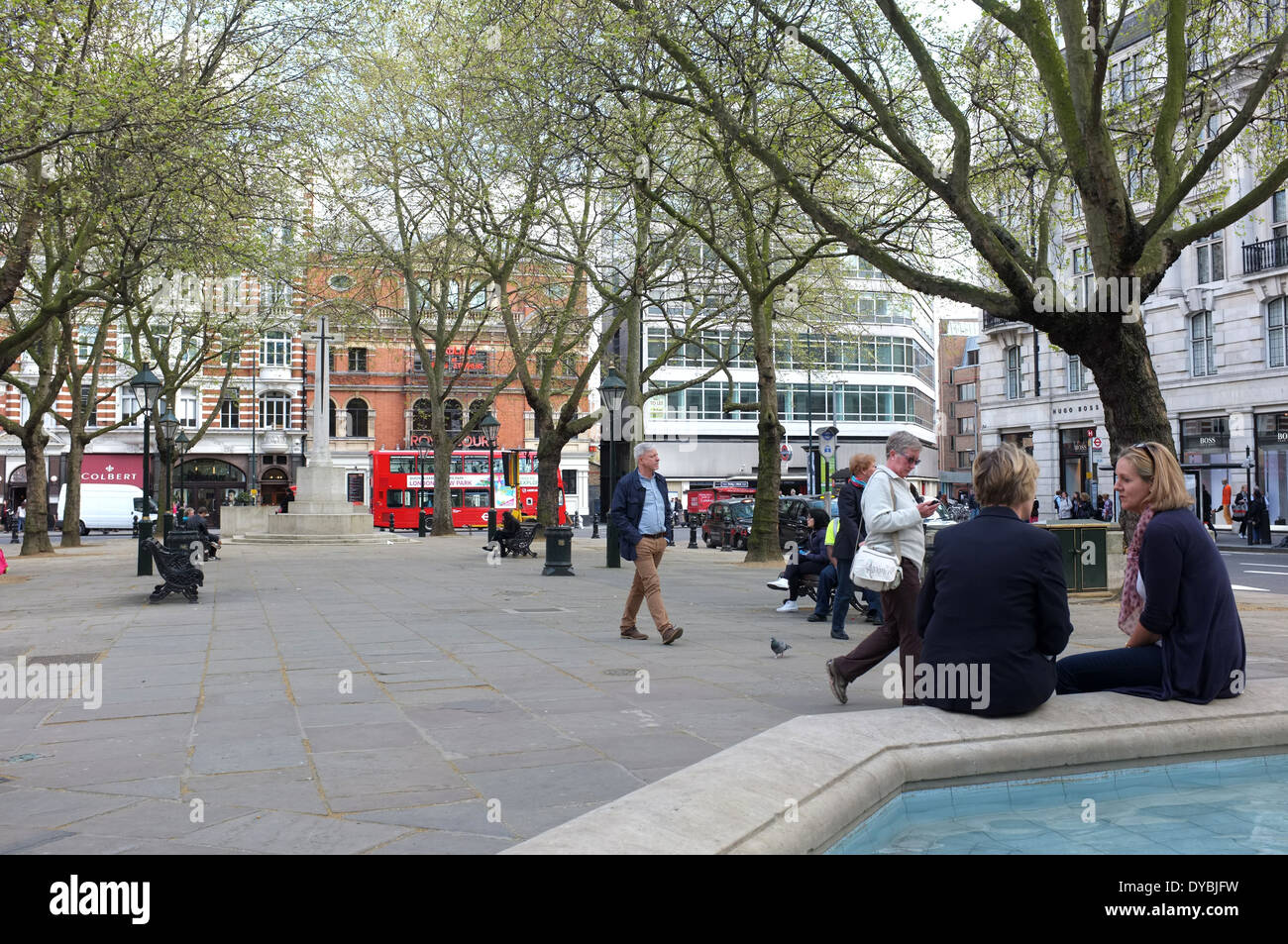sloane square is a small hard-landscaped square on the boundaries of the west london districts of  chelsea, belgravia Stock Photo