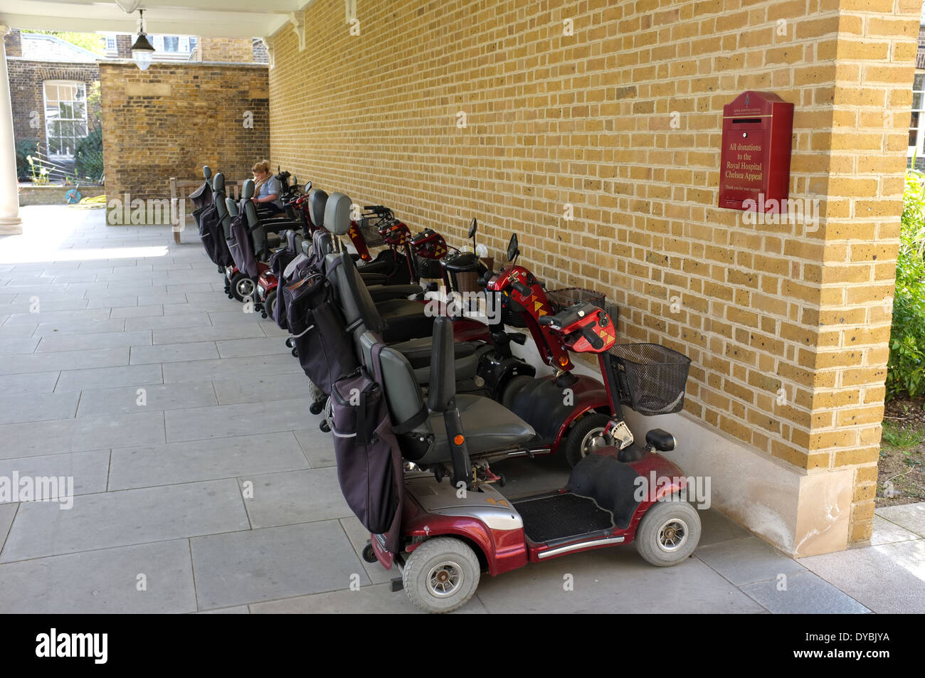 disabled mobility scooters in the grounds of the royal hospital chelsea the home for chelsea pensioners london sw3 uk Stock Photo