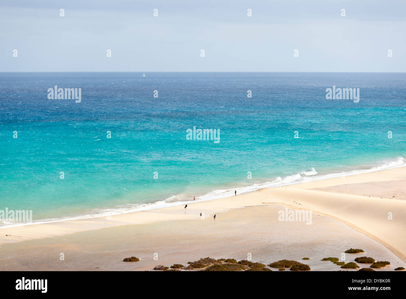 Playa de Sotavento with its beautiful lagoon and some tourists next to a large dune. Stock Photo