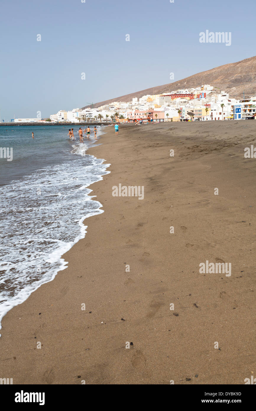 People on the beach of Gran Tarajal in Fuerteventura, Spain Stock Photo