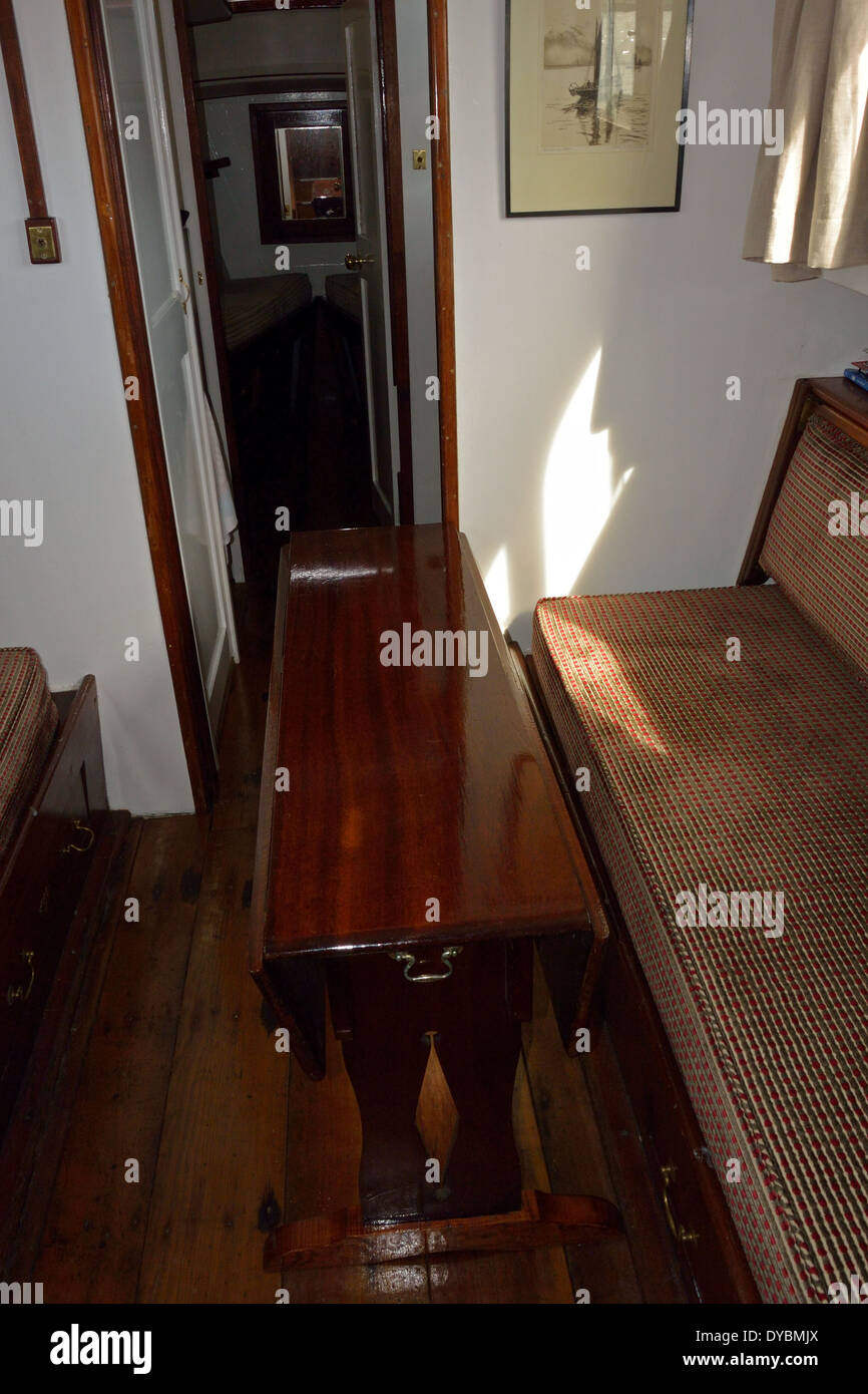 Saloon in the traditional Broads cruiser Shaft of Light, Broads National Park Stock Photo