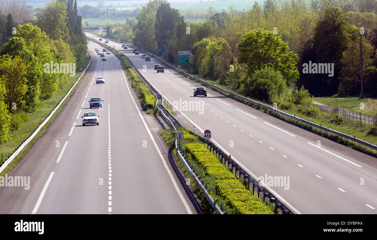 French autoroute motorway sunny day light traffic Stock Photo