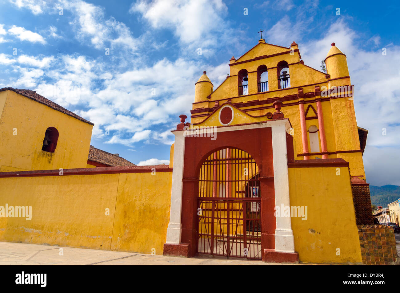View of a yellow and red church in San Cristobal de las Casas in Chiapas, Mexico Stock Photo