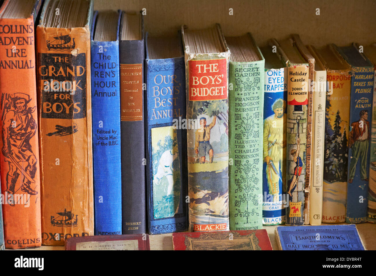 Row of old books on shelf Stock Photo Alamy