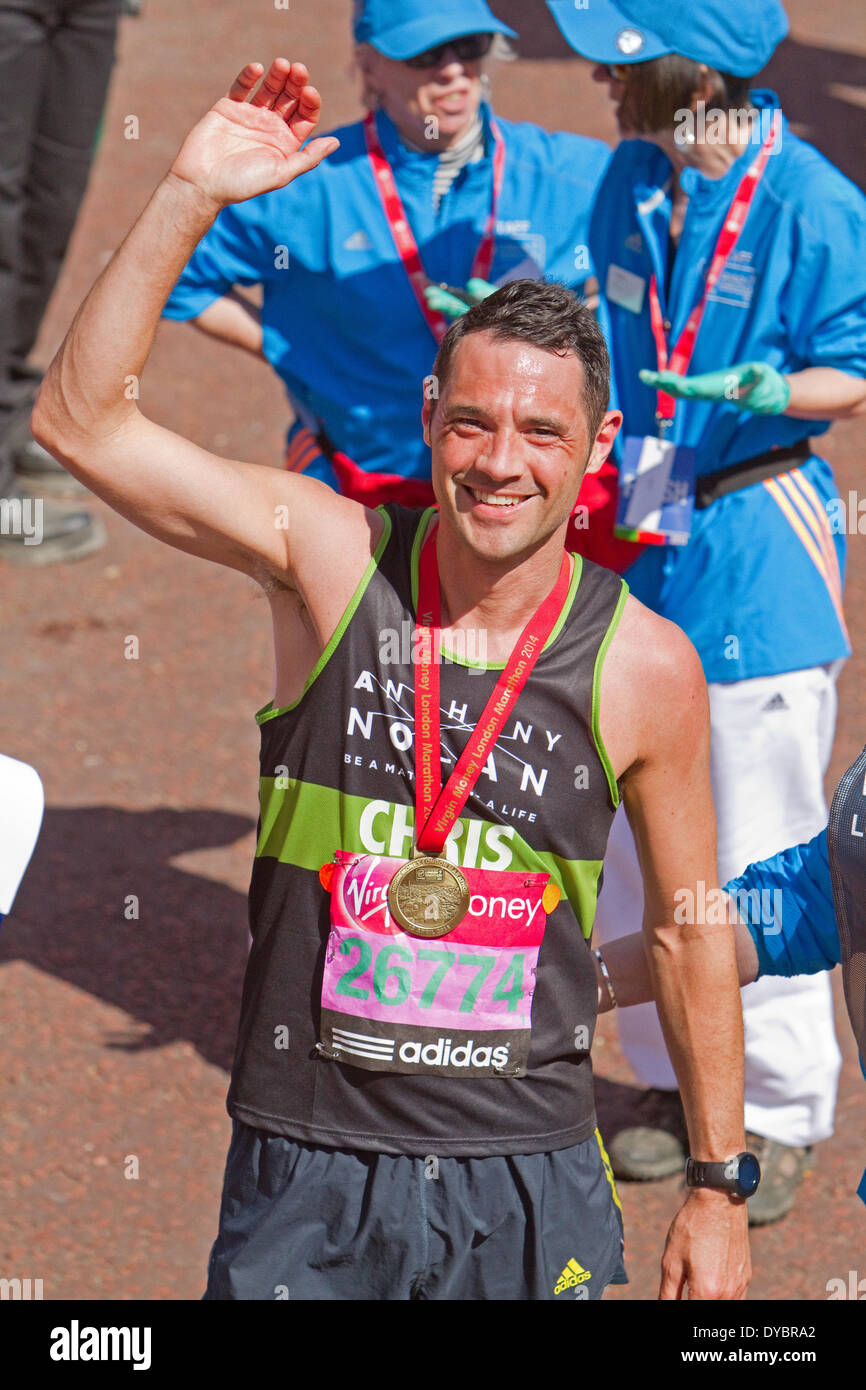 London, UK. 13th April, 2014. Chris Newton 26774 after finishing the London Marathon 2014 Credit:  Keith Larby/Alamy Live News Stock Photo
