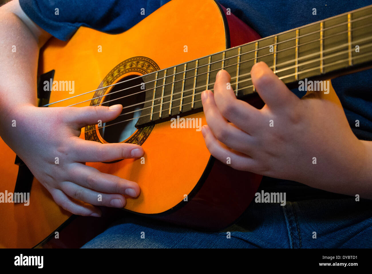 Strumming the guitar hires stock photography and images Alamy