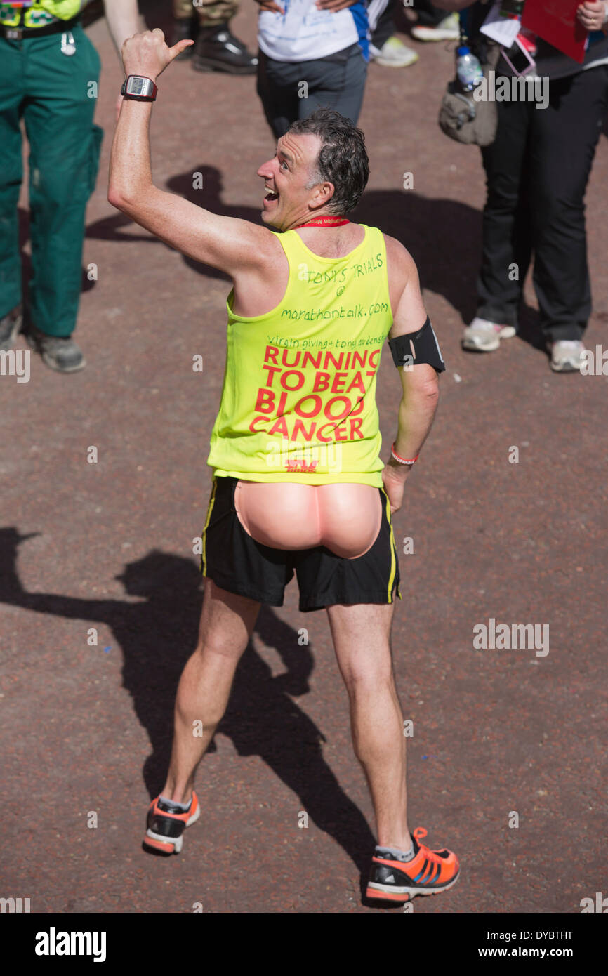 London, UK. 13 April 2014. Actor Tony Audenshaw at the finish. In 2014, more than 36,000 participants signed up to race in the marathon, with most of them raising money for charity. Photo: Credit:  Nick Savage/Alamy Live News Stock Photo