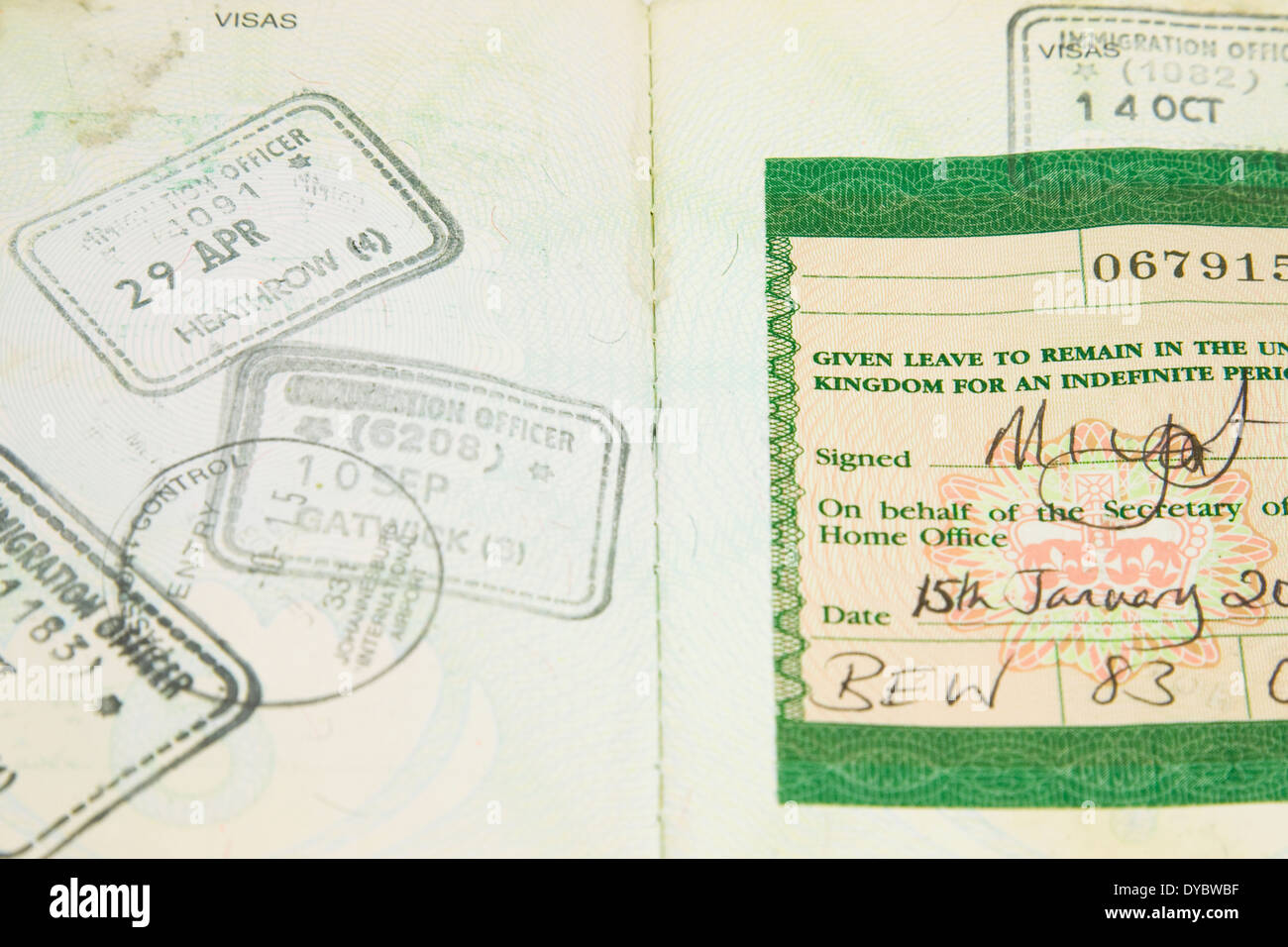 foreign passport with a British Immigration Visa stamps Stock Photo