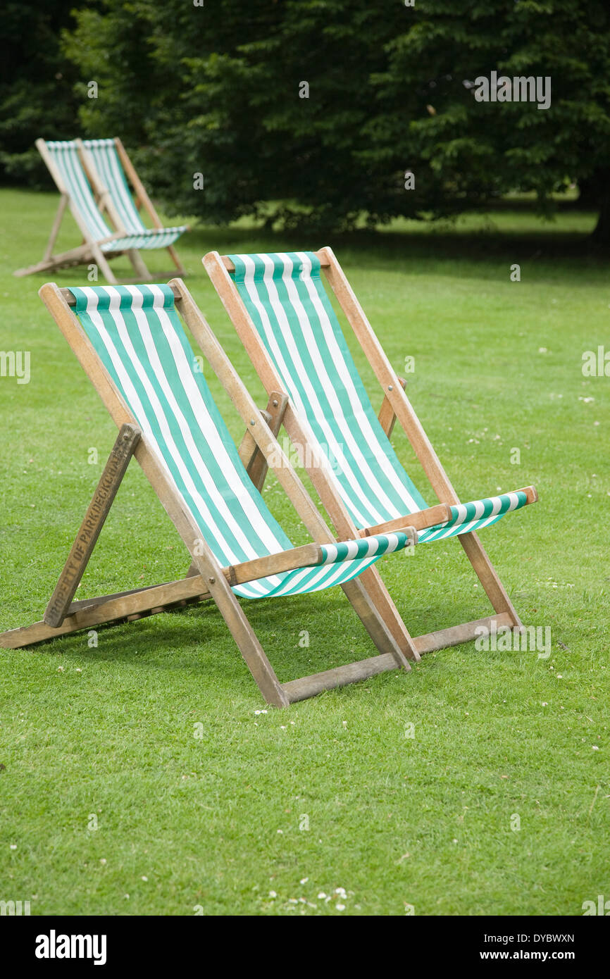 Deck chairs in the park Stock Photo - Alamy