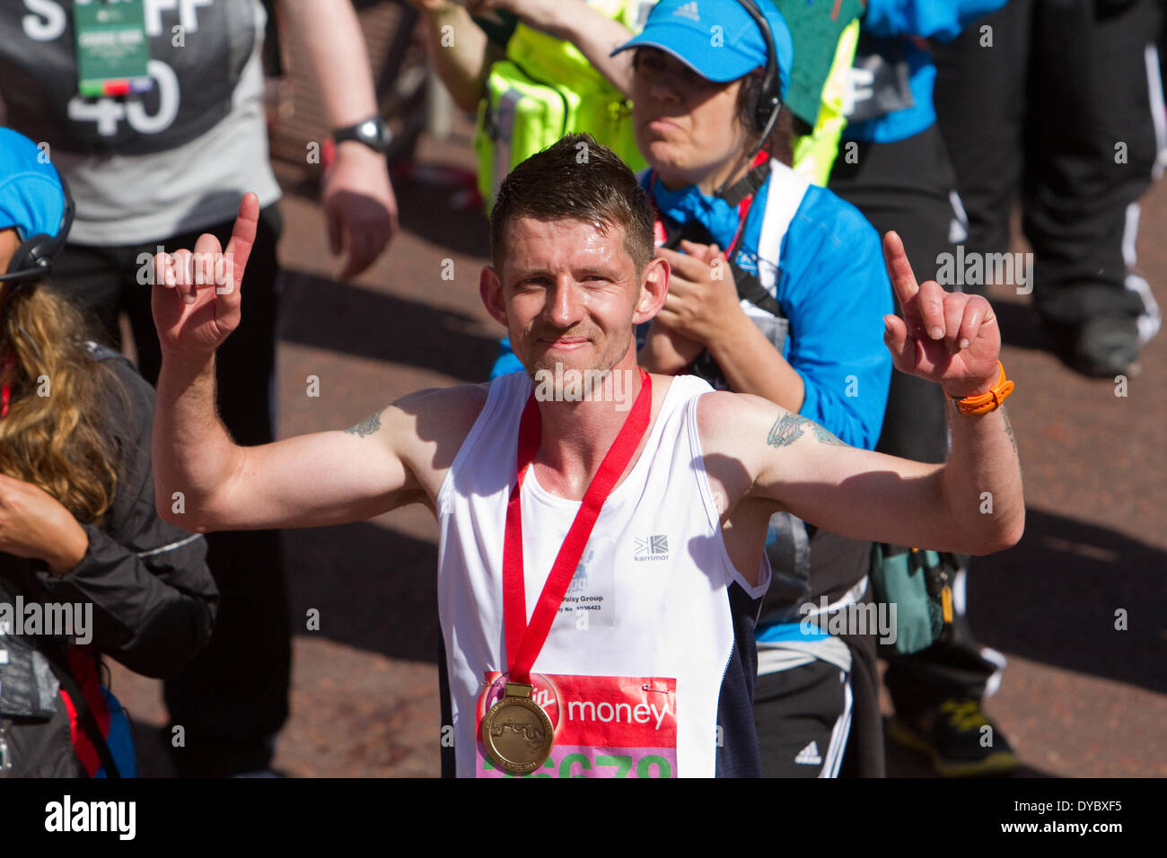 London,UK,13th April 2014,A male runner after finishing the London Marathon 201 Credit: Keith Larby/Alamy Live News Stock Photo