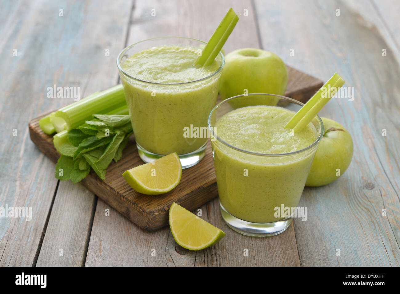 Smoothie of green apple, celery, avocado and lime on wooden background  Stock Photo - Alamy