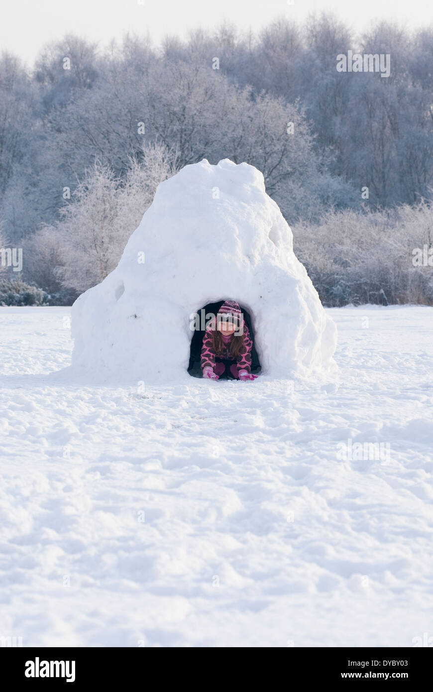 Igloo. Children playing in the snow in an Igloo. Stock Photo