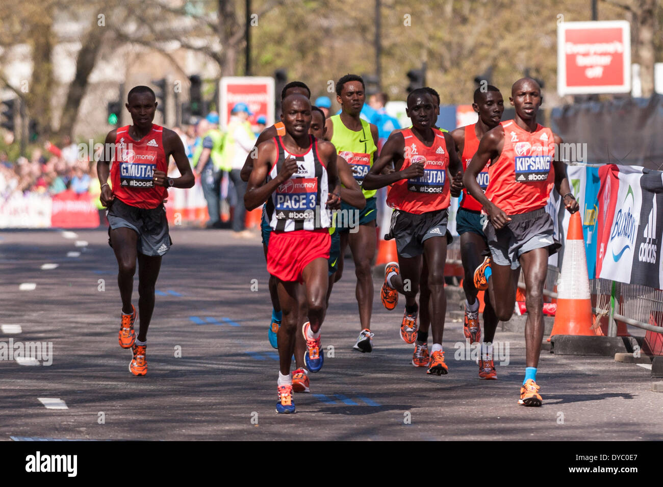 East Smithfield, London, UK, 13 April 2014, near mile 13, Virgin Money London Marathon 2014.  Elite men's lead pack includes Wilson Kipsang (Kenya), right, who would go on to win the race in a course record time of 2:04.27, and earn his second London Marathon title.   Credit:  Stephen Chung/Alamy Live News Stock Photo