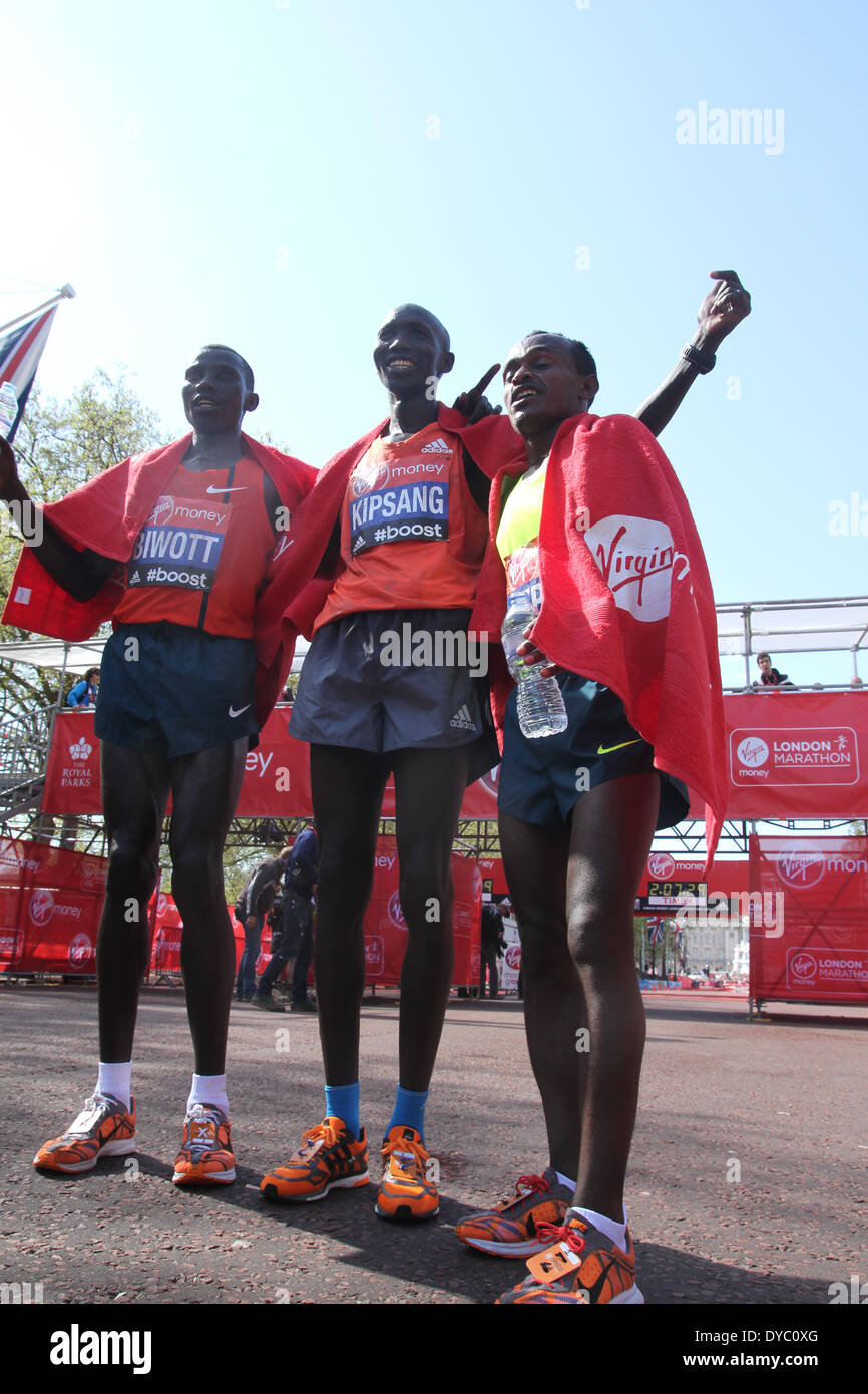 London, UK. 13th Apr, 2014. Stanely Biwott, Wilson Kipsang and Tsegaye Kibede at the finish of the 34th London Marathon. Credit:  David Mbiyu/Alamy Live Newsu Stock Photo