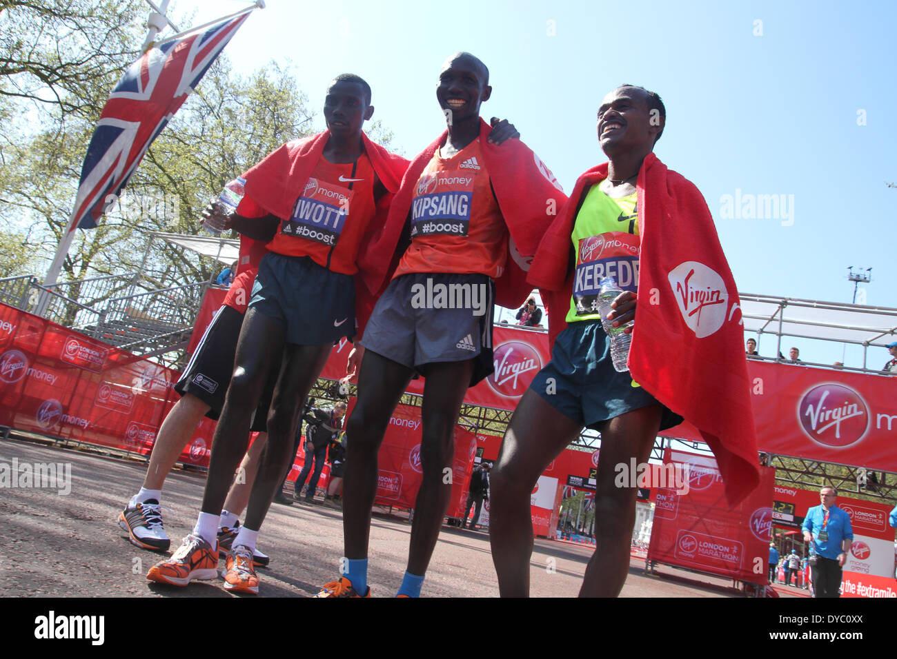 London, UK. 13th Apr 2014. Stanely Biwott, Wilson Kipsang and Tsegaye Kibede at the finish of the 34th London Marathon. Credit:  David Mbiyu/Alamy Live News Stock Photo