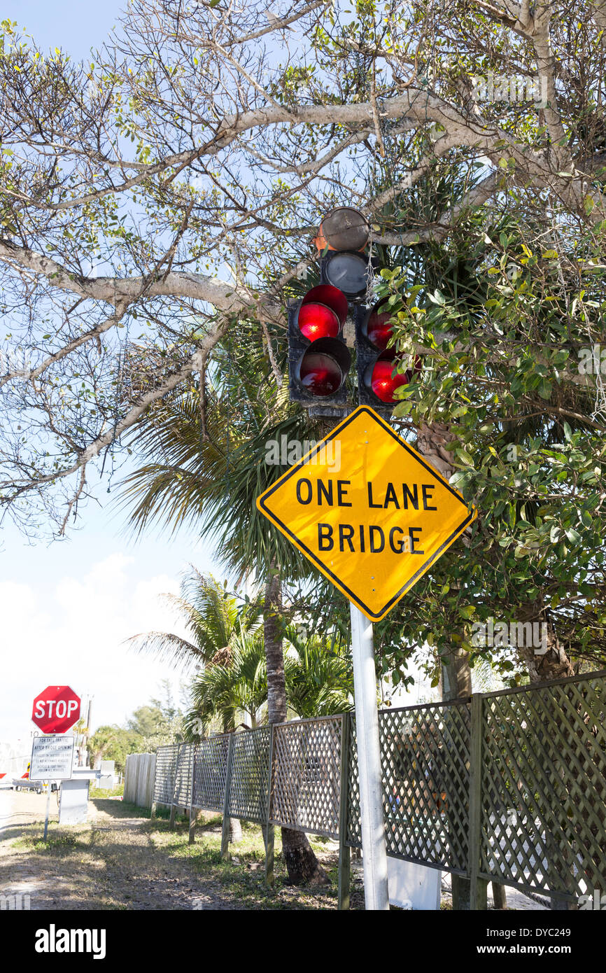 Flashing Lights and Sign, One Lane Bridge, Casey Key, Florida, USA Stock Photo