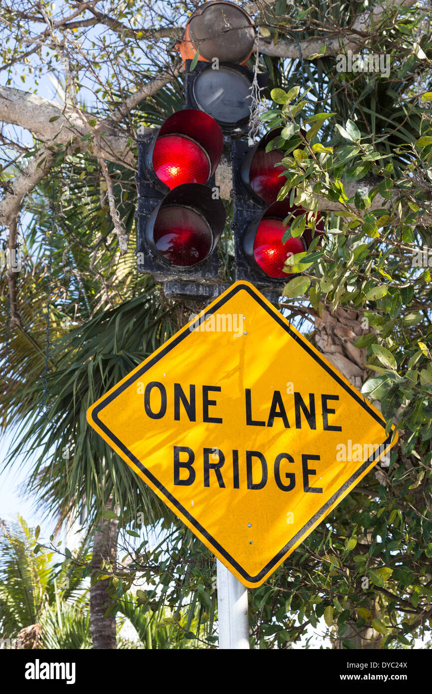 Flashing Lights and Sign, One Lane Bridge, Casey Key, Florida, USA Stock Photo