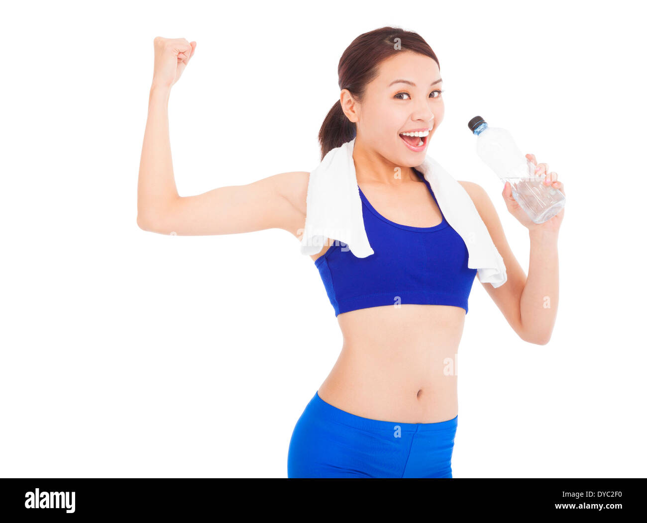 asian woman drinking water and muscular pose in studio Stock Photo