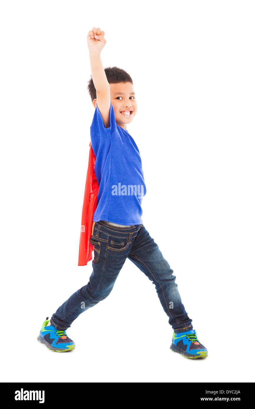 happy superhero kid hero raise hand in studio Stock Photo