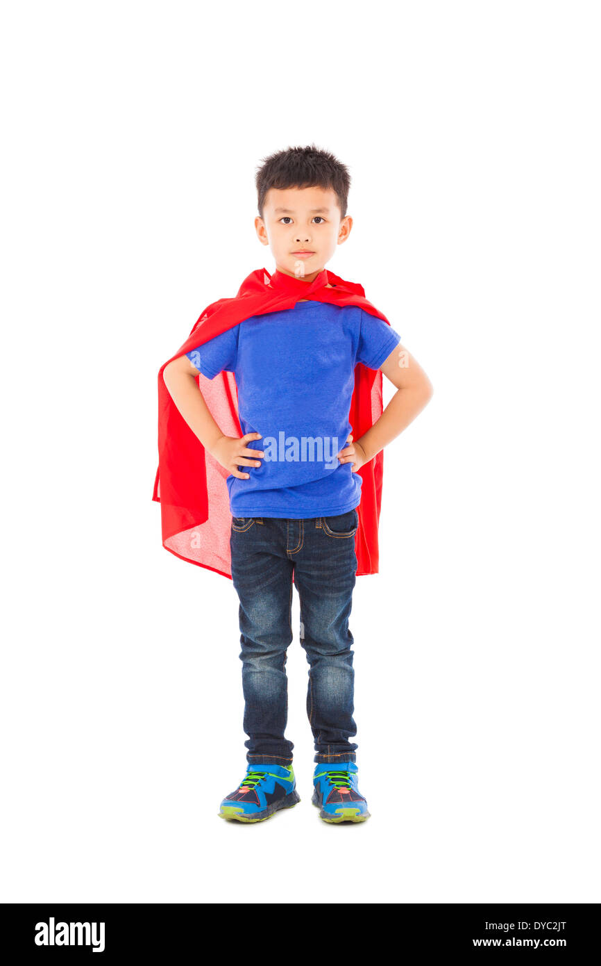 smiling Superhero kid standing over white background Stock Photo