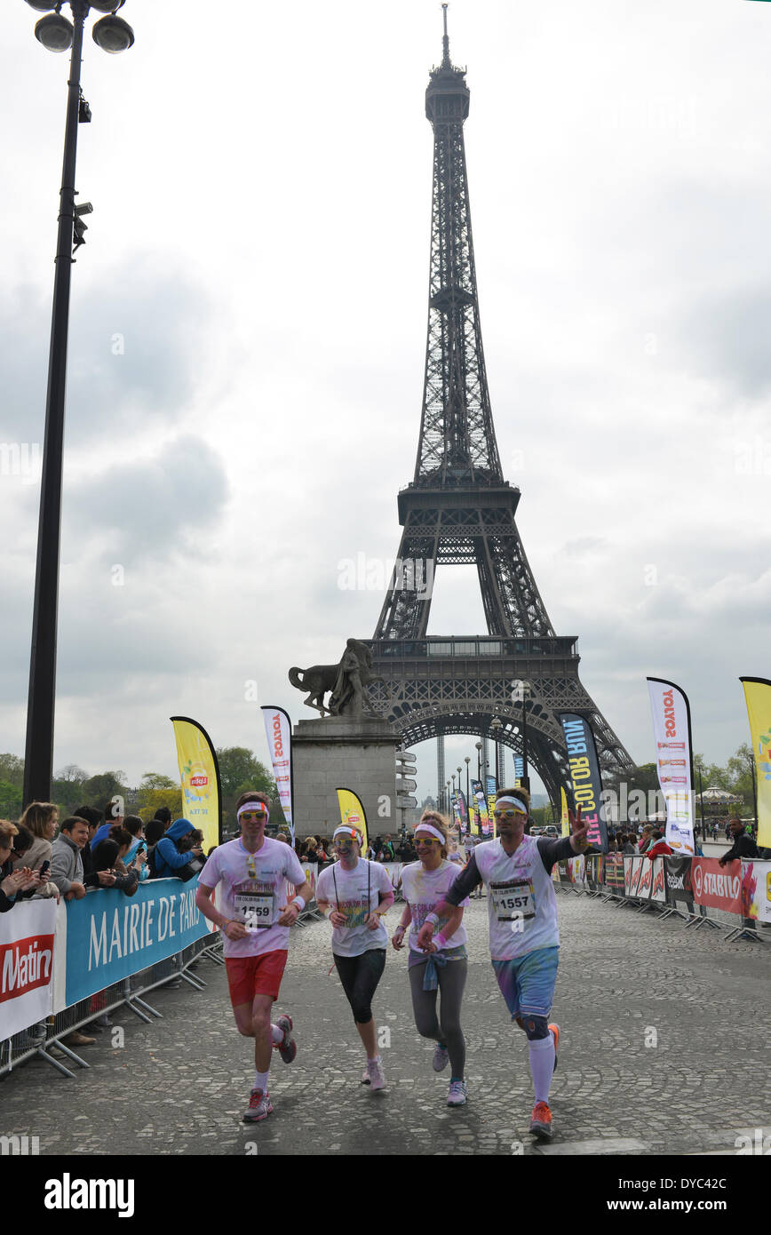 Paris, France. 13th Apr, 2014. Runners covered in coloured powder take part in the 5-kilometer Color Run race in Paris, capital of France, on April 13, 2014. Credit:  Li Genxing/Xinhua/Alamy Live News Stock Photo