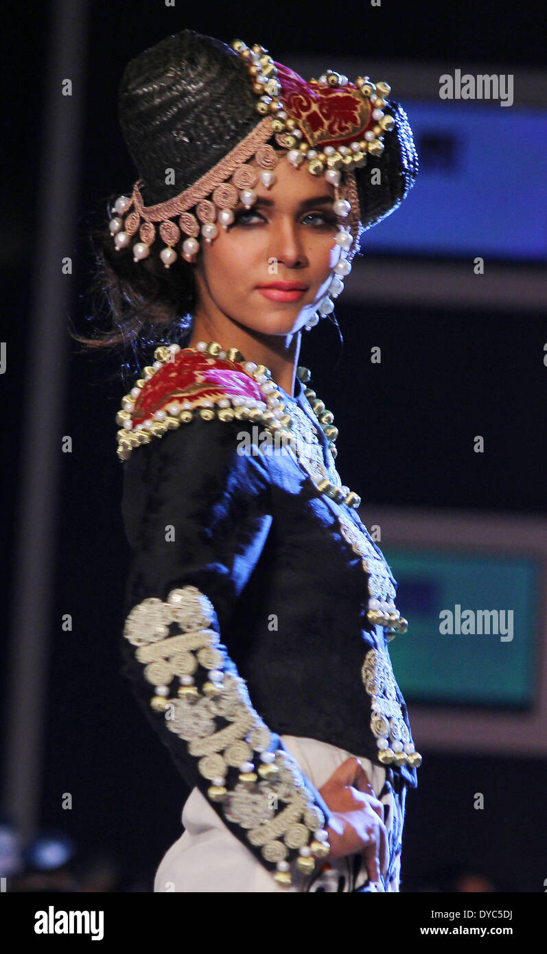 LAHORE, PAKISTAN - APRIL 13 : Pakistani Models present creations by ...