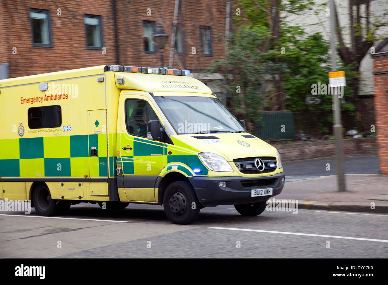 Moving Ambulance on St John's Hill in SW11 - London UK Stock Photo