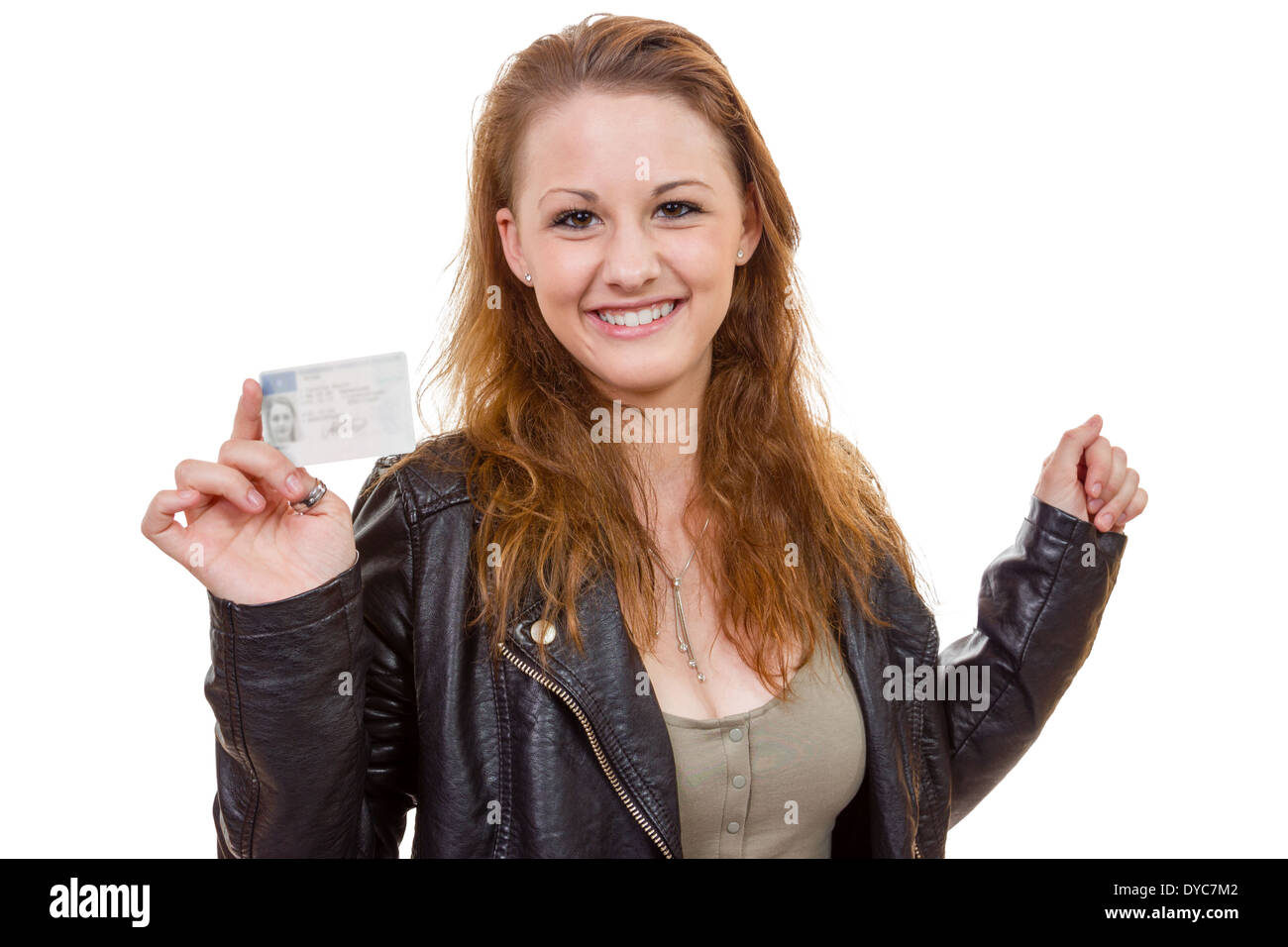 16 to 18 year old girl just received her driver license Stock Photo
