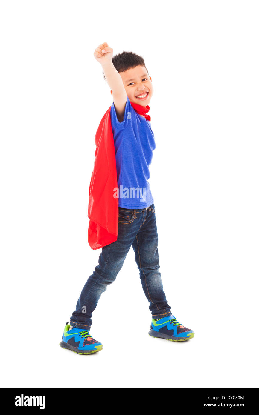 happy superhero kid imitate flying pose Stock Photo
