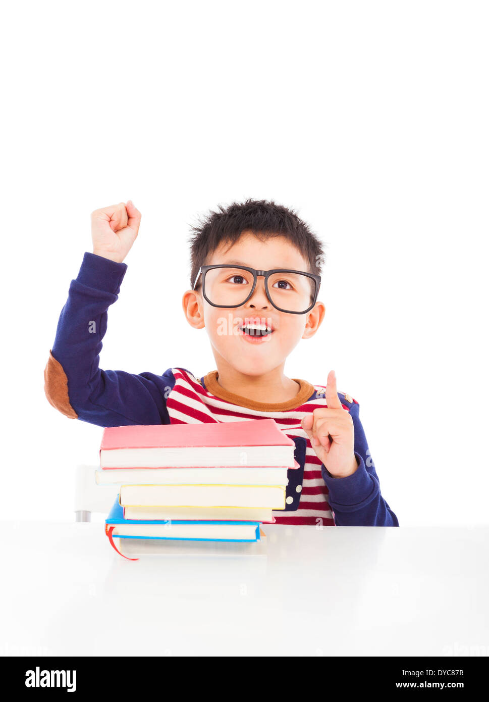 little boy think out a good ideas and raise hand Stock Photo
