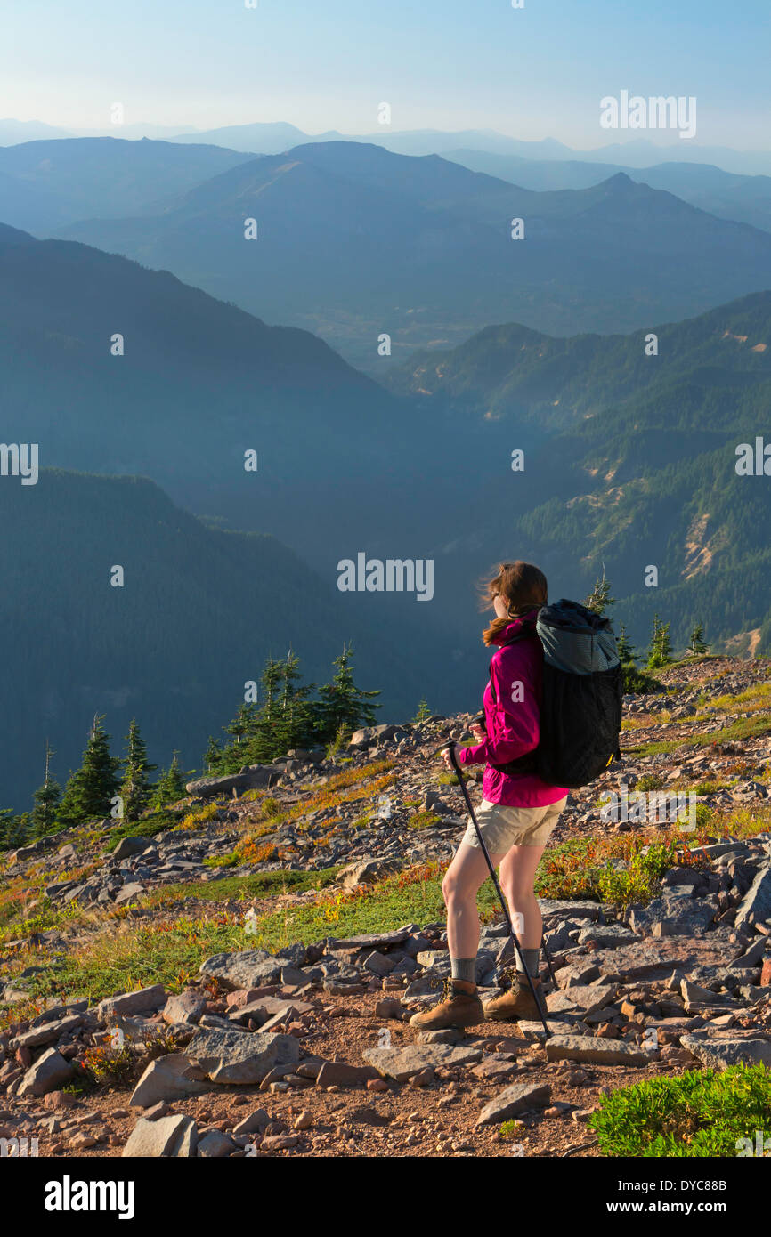 A woman backpacks with a Six Moon Design backpack on the Pacific Crest Trail in Oregon Summer USA Cory Lahr is the model Model Stock Photo