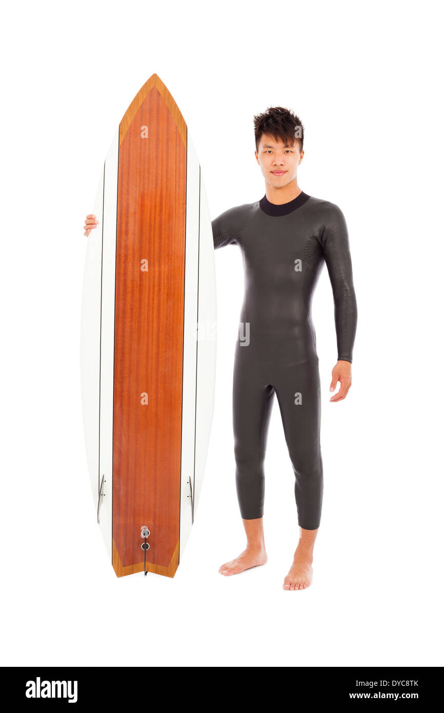 surfer man standing and holding a surfboard Stock Photo