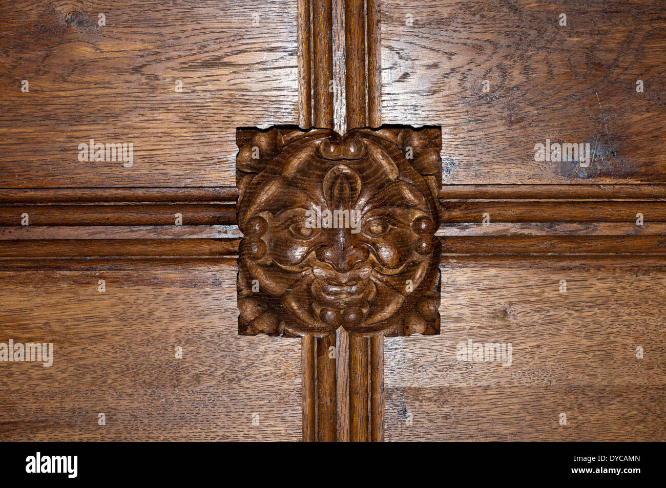 A ceiling boss carved with the face of a Green Man in All Saints church, Upper Sheringham, Norfolk. Stock Photo