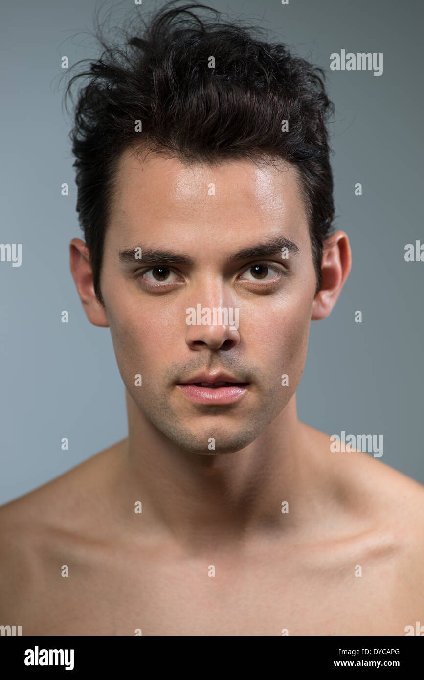 A handsome man, Caucasian male model portrait, model headshot, male hairstyle concept, face close-up beauty concept. Stock Photo