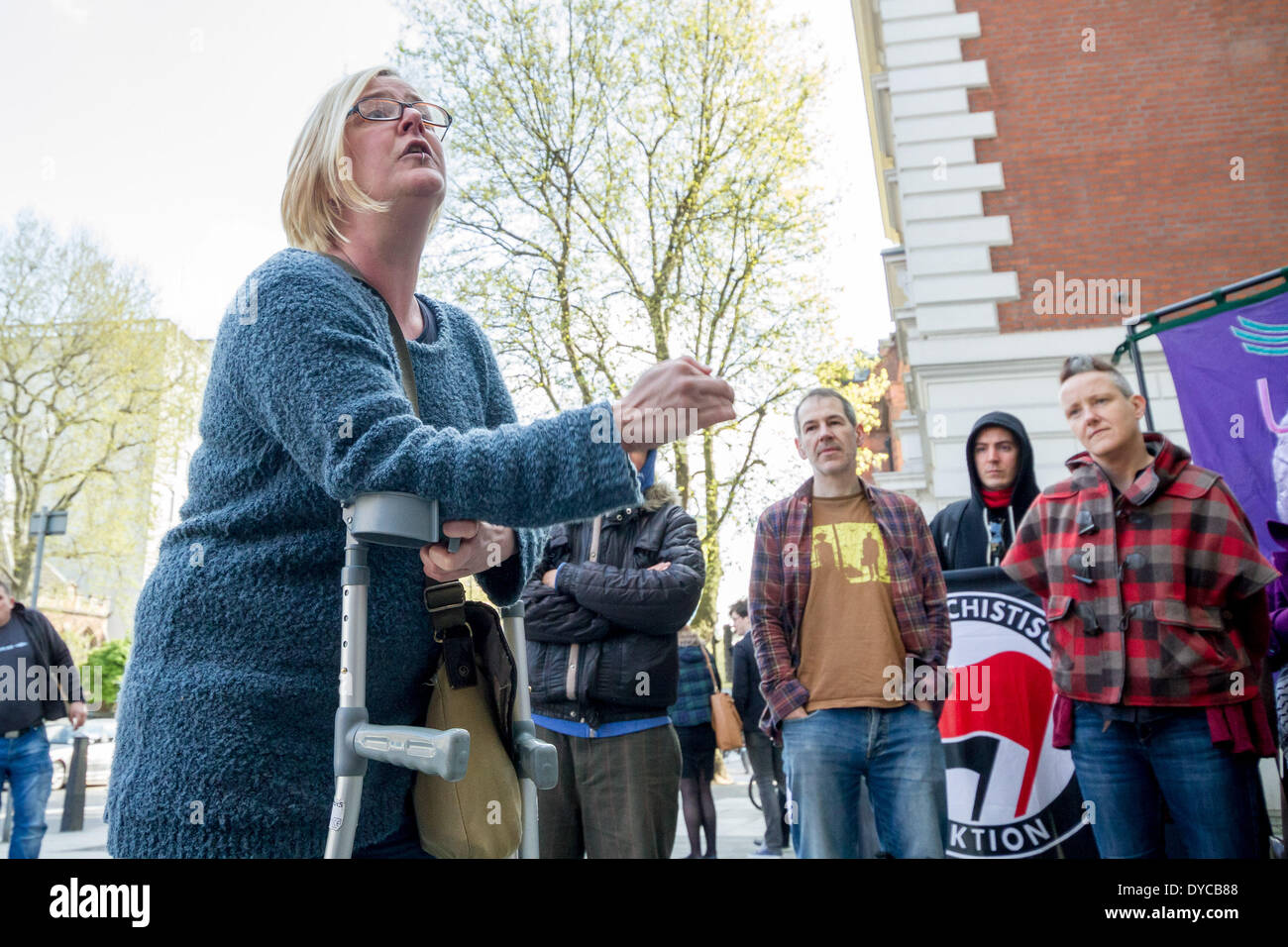 London, UK . 14th Apr, 2014. Amy Jowett, anti-fascist protester whose leg was broken by the police on 1st June 2013 during a counter-demonstration against the BNP, joins the solidarity protest for the ‘Antifascist Five’ demonstrators outside Westminster Magistrates Court, London. Credit:  Guy Corbishley/Alamy Live News Stock Photo