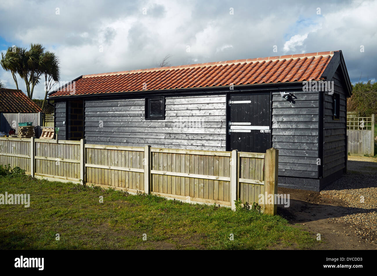 Large timber garden shed Stock Photo - Alamy