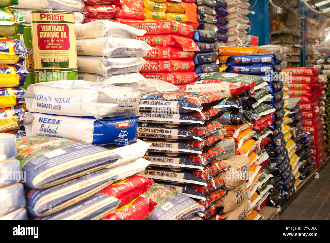 Stacks Of Bags Of Rice Sold At A Grocery Shop In Ealing Road In North stacks-of-bags-of-rice-sold-at-a-grocery-shop-in-ealing-road-in-north