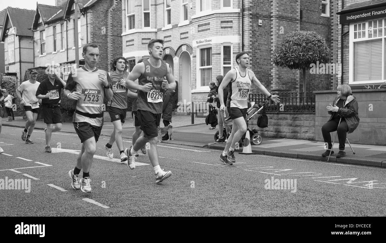 The 2014 Manchester Marathon: Runners reach  Market Street, Altrincham in Cheshire Stock Photo