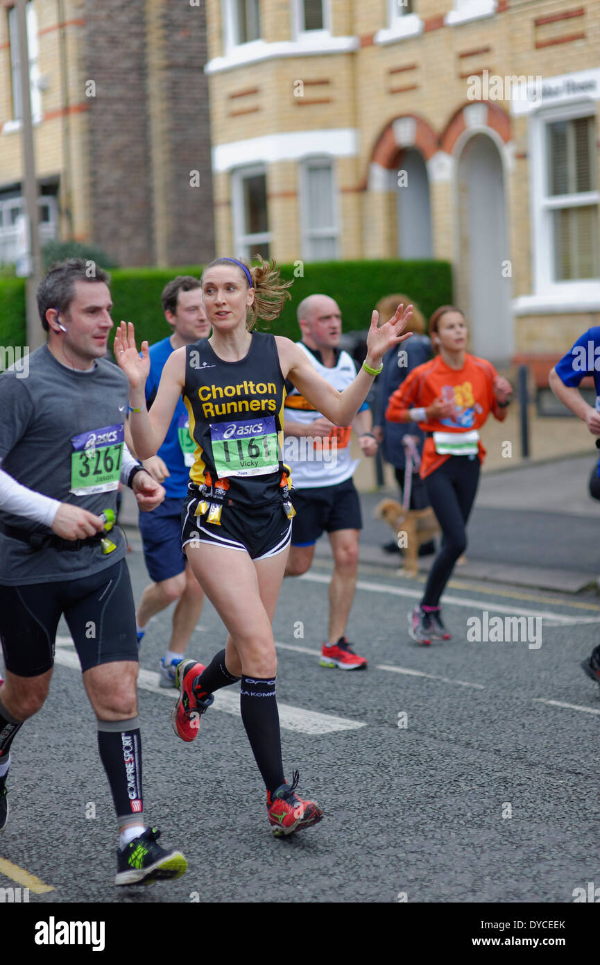 The 2014 Manchester Marathon Runners reach Altrincham in Cheshire