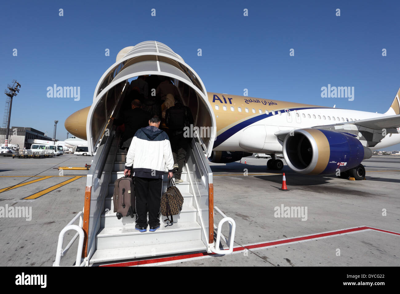 Gulf Air aircraft boarding. Manama, Kingdom of Bahrain Stock Photo