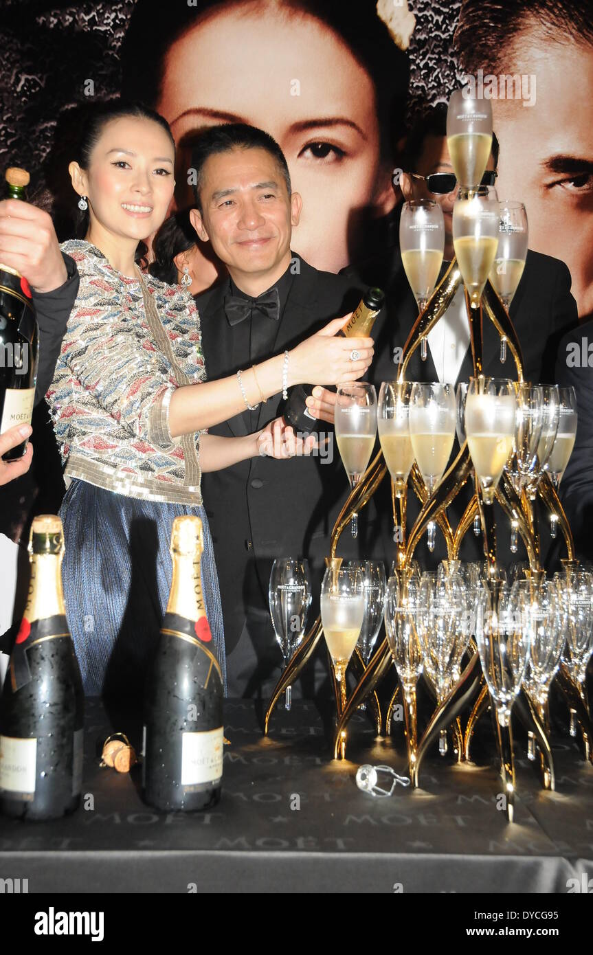 Hong Kong. 13th Apr, 2014. Zhang Ziyi and Tony Leung at celebration party after The 33rd Hong Kong Film Awards in Hong Kong, China on Sunday April 13, 2014.Wong Karwai's kungfu epic 'The Grandmaster' was the biggest winner at the 33rd Hong Kong Film Awards, held on the night of April 13, as the film took home 12 awards, including Best Film, Best Director, Best Screenplay and Best Actress. Credit:  Top Photo Corporation/Alamy Live News Stock Photo