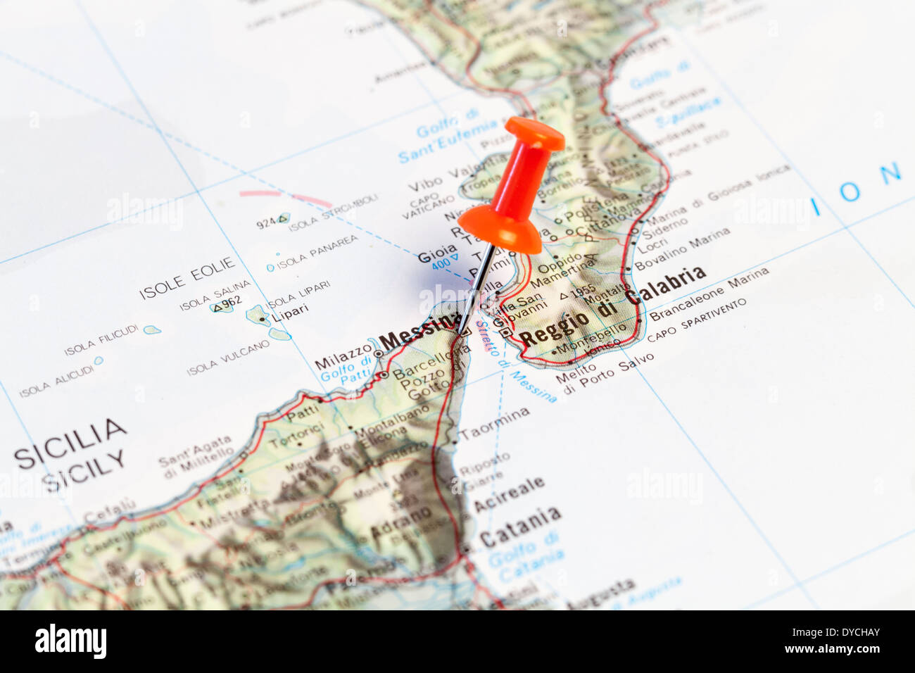Red map pin pointing on map to the city of Messina. Stock Photo