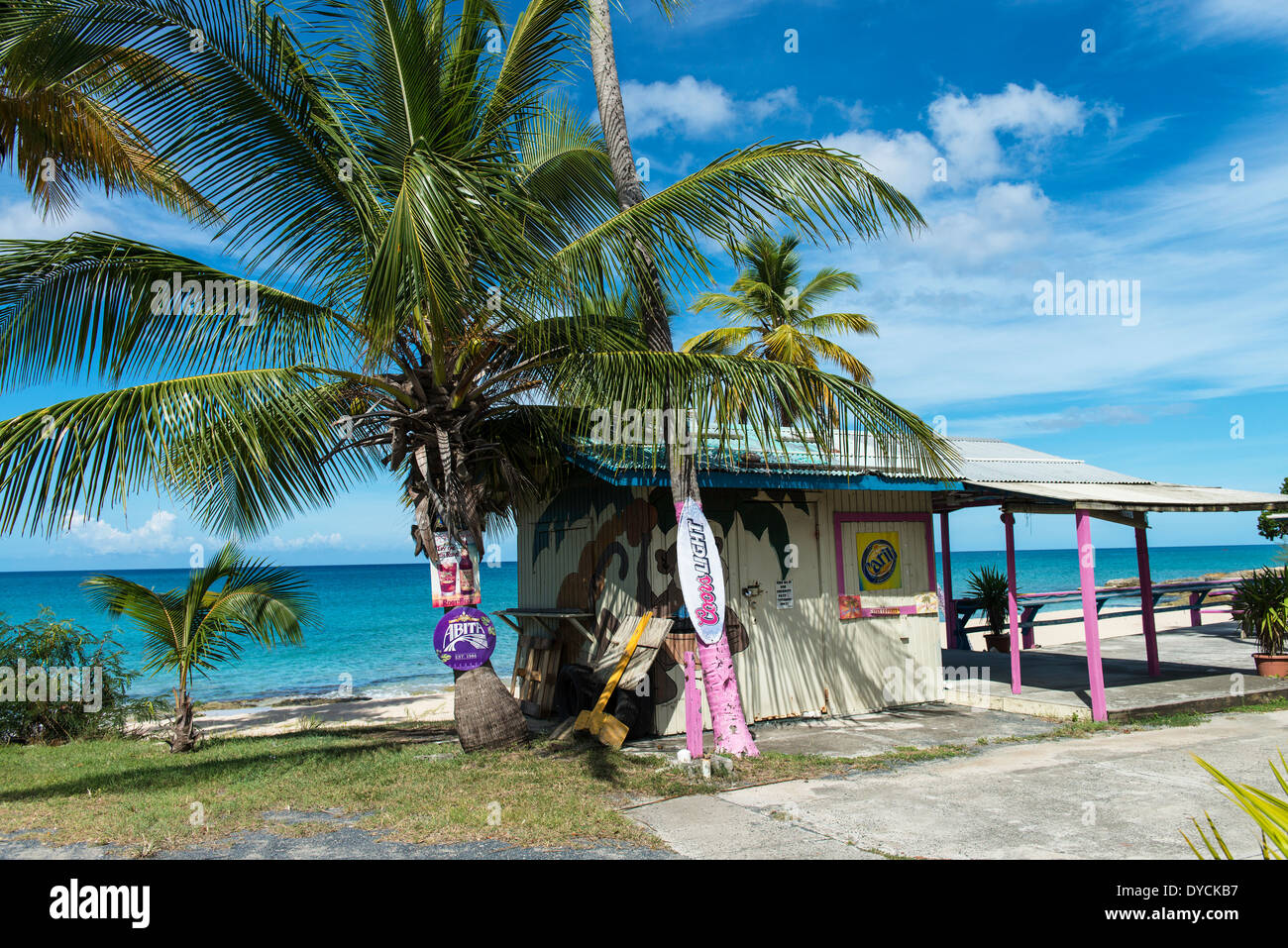A closed drink stand on the beach, west end, of St. Croix, U. S. Virgin Islands. Caribbean sea in the background. Stock Photo