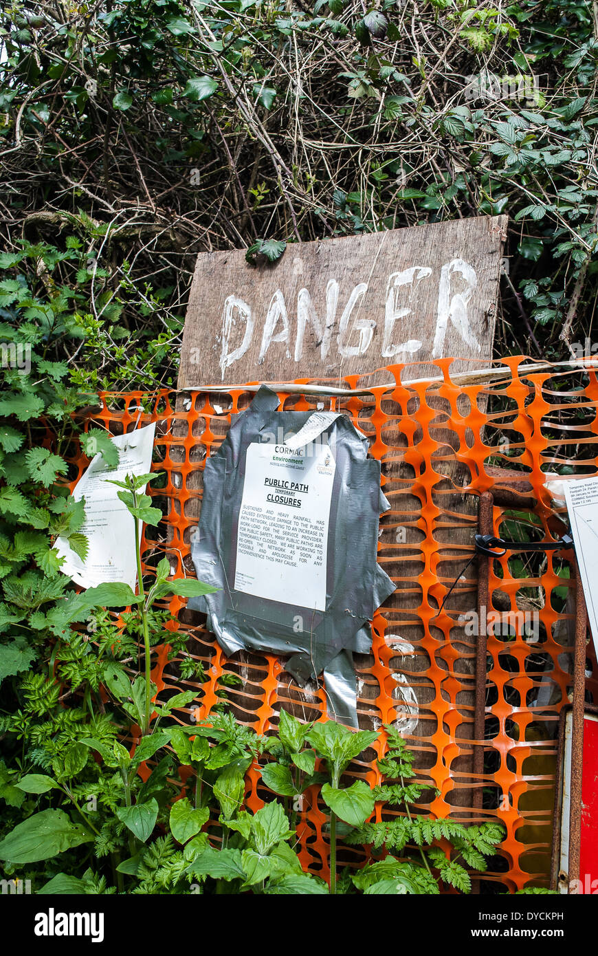 A Sign warning of danger on the Southwest Coastpath in the UK Stock Photo