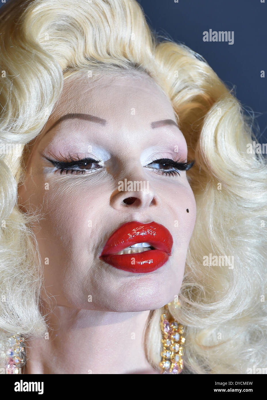 US model, nightlife and fashion icon, performance artist, recording artist and transgender public figure Amanda Lepore arrives for the opening of the first Harald Gloeoeckner store on Georgenstrasse in Berlin, Germany, 14 April 2014. Photo: JENS KALAENE/DPA Stock Photo