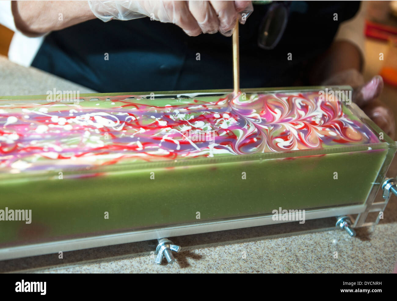 A woman / soaper making handcrafted soap Stock Photo