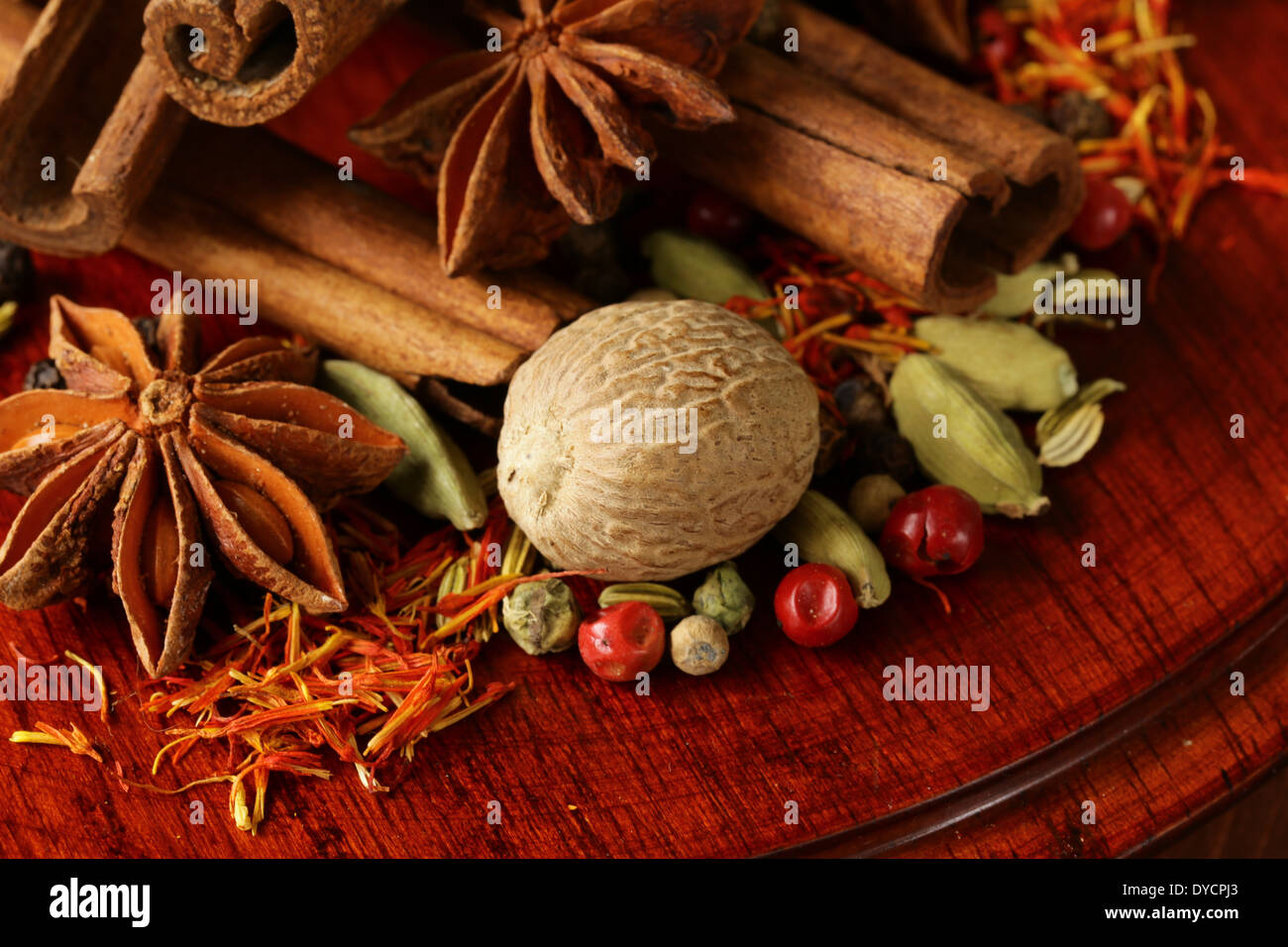 various spices (nutmeg, cinnamon, star anise, saffron, pepper, cardamom