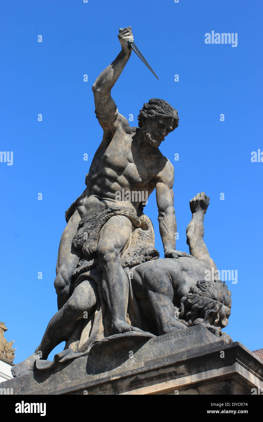 Sculpture above columns flanking the main gates to Prague castle (Hrad) Stock Photo
