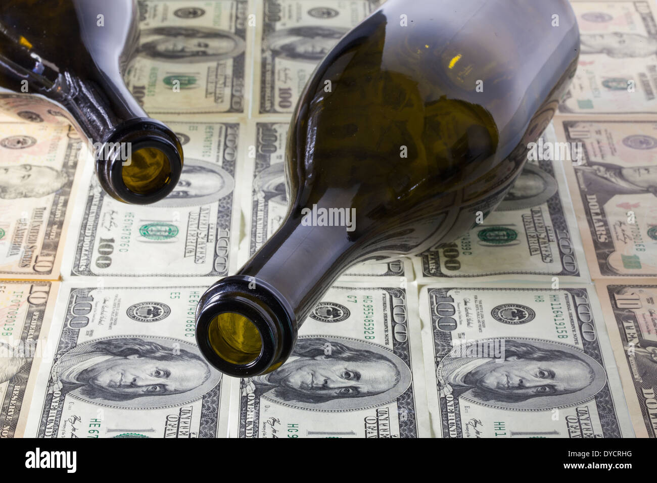 Two empty wine bottle and US dollar banknotes Stock Photo Alamy